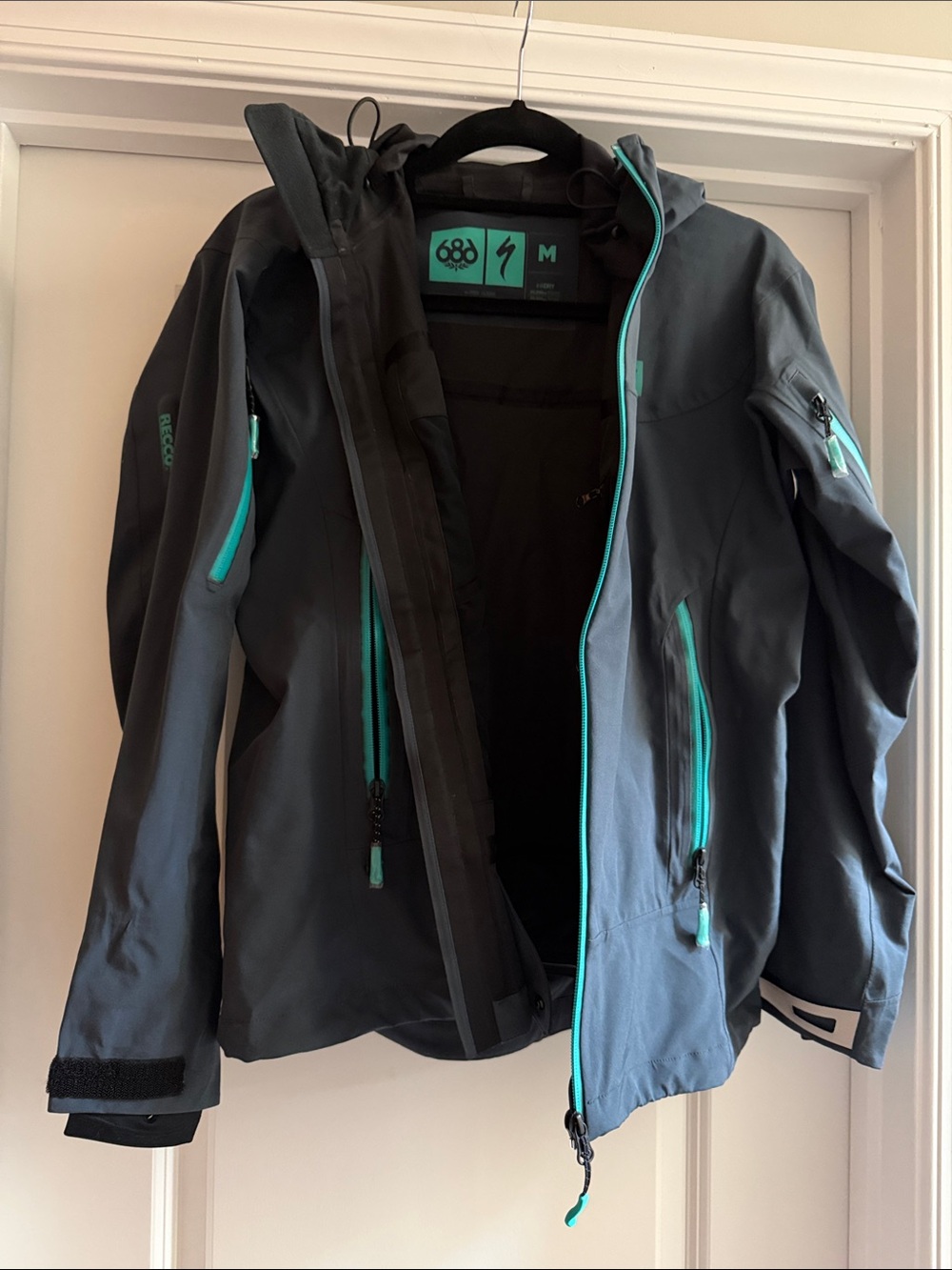 686 Women's Dark Gray & Teal rain Jacket.